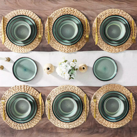 Sata green stoneware dinnerware set styled dining table with dinner plates salad plates pasta bowls cereal bowls silverware and floral centerpiece farmhouse reactive glaze service for 6
