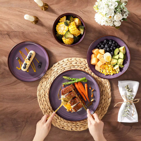 Sata purple stoneware dinnerware set styled dining table with dinner plates salad plates pasta bowls cereal bowls silverware and floral centerpiece farmhouse reactive glaze service for 6