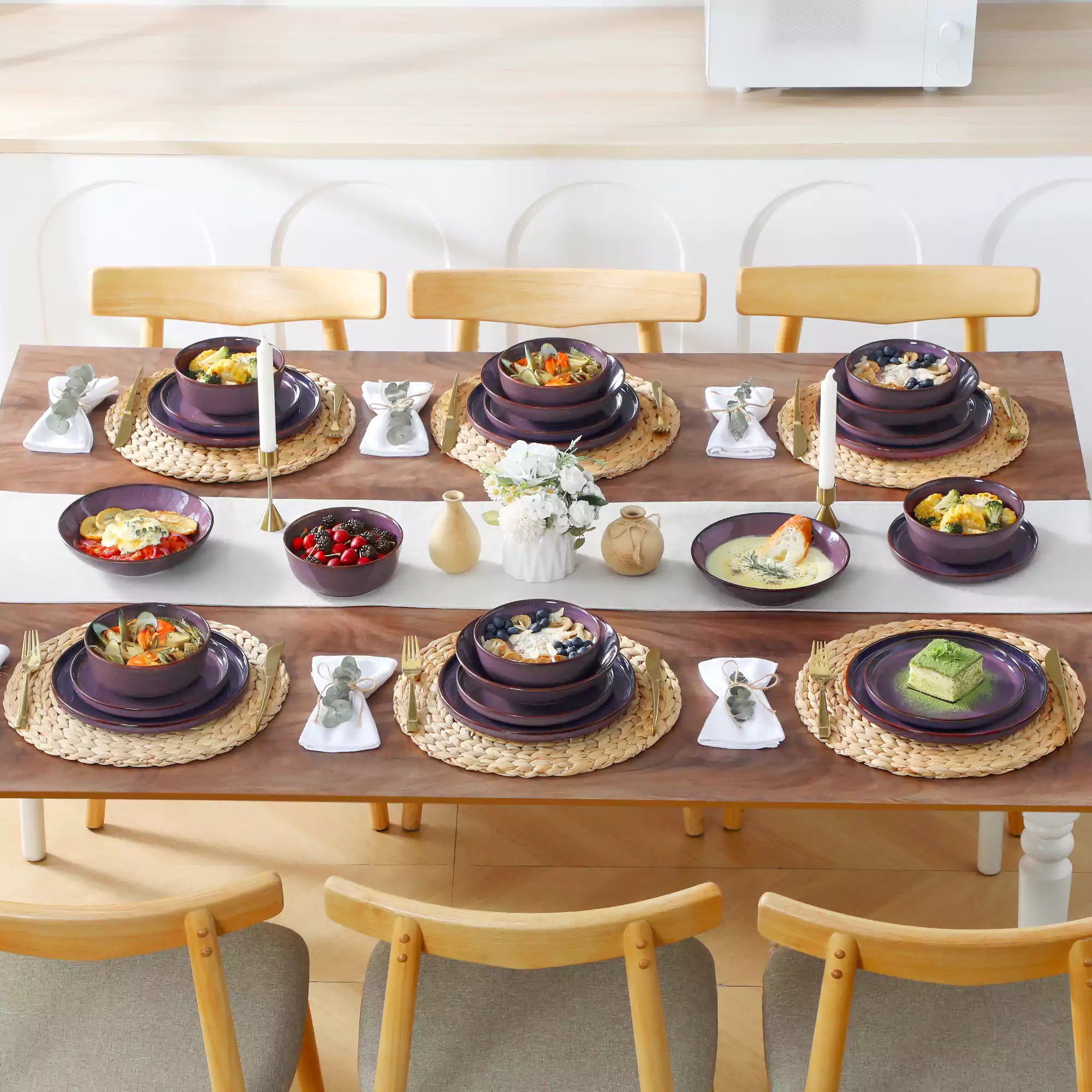 Sata purple stoneware dinnerware set styled dining table with dinner plates salad plates pasta bowls cereal bowls silverware and floral centerpiece farmhouse reactive glaze service for 6