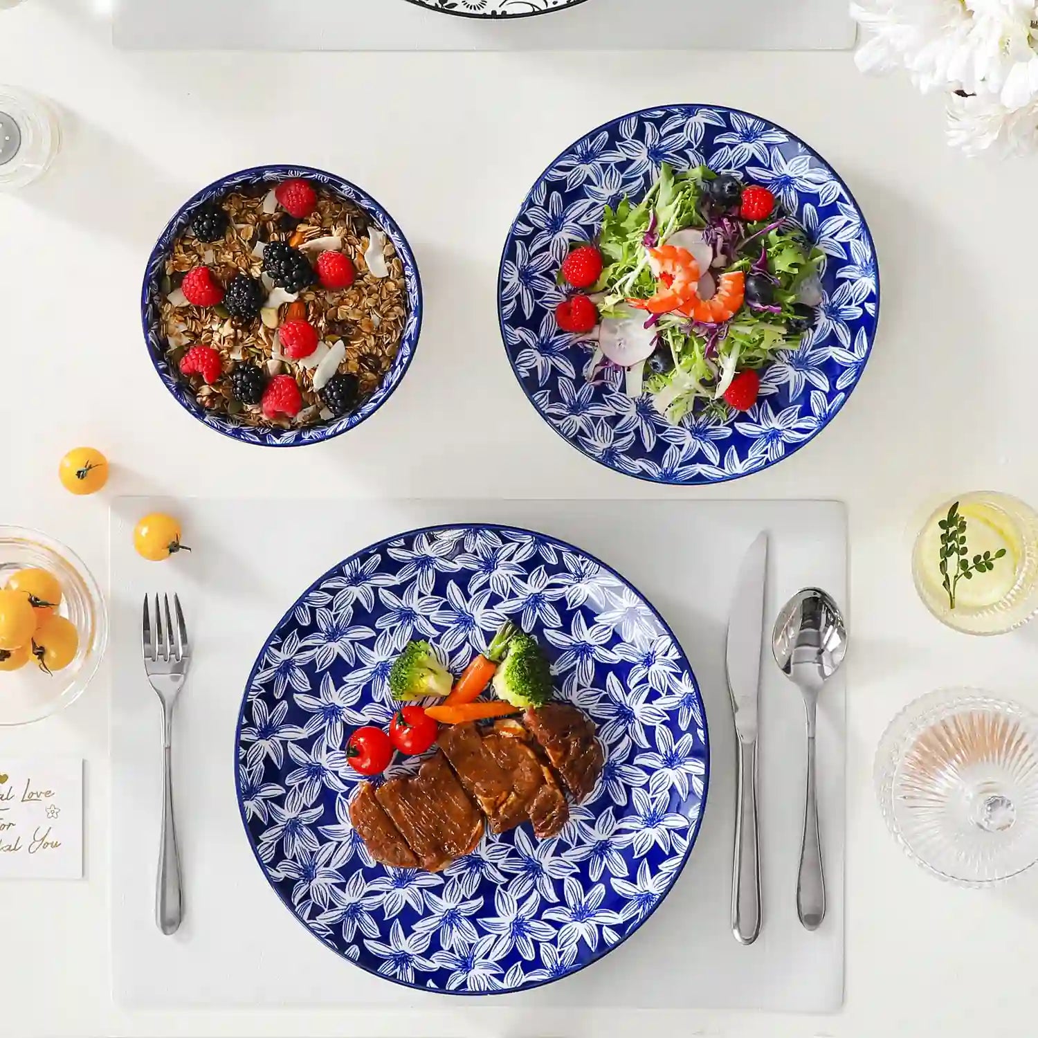Selene porcelain 12 piece dinnerware set service for 4 vibrant floral geometric plates bowls flat lay with cutlery