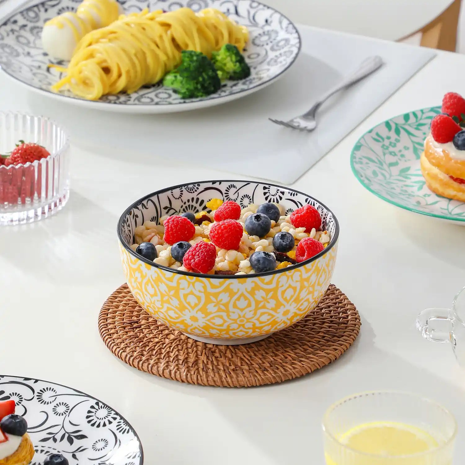 Selene porcelain vibrant dinnerware set colorful floral geometric plates bowls table setting with fork knife glass