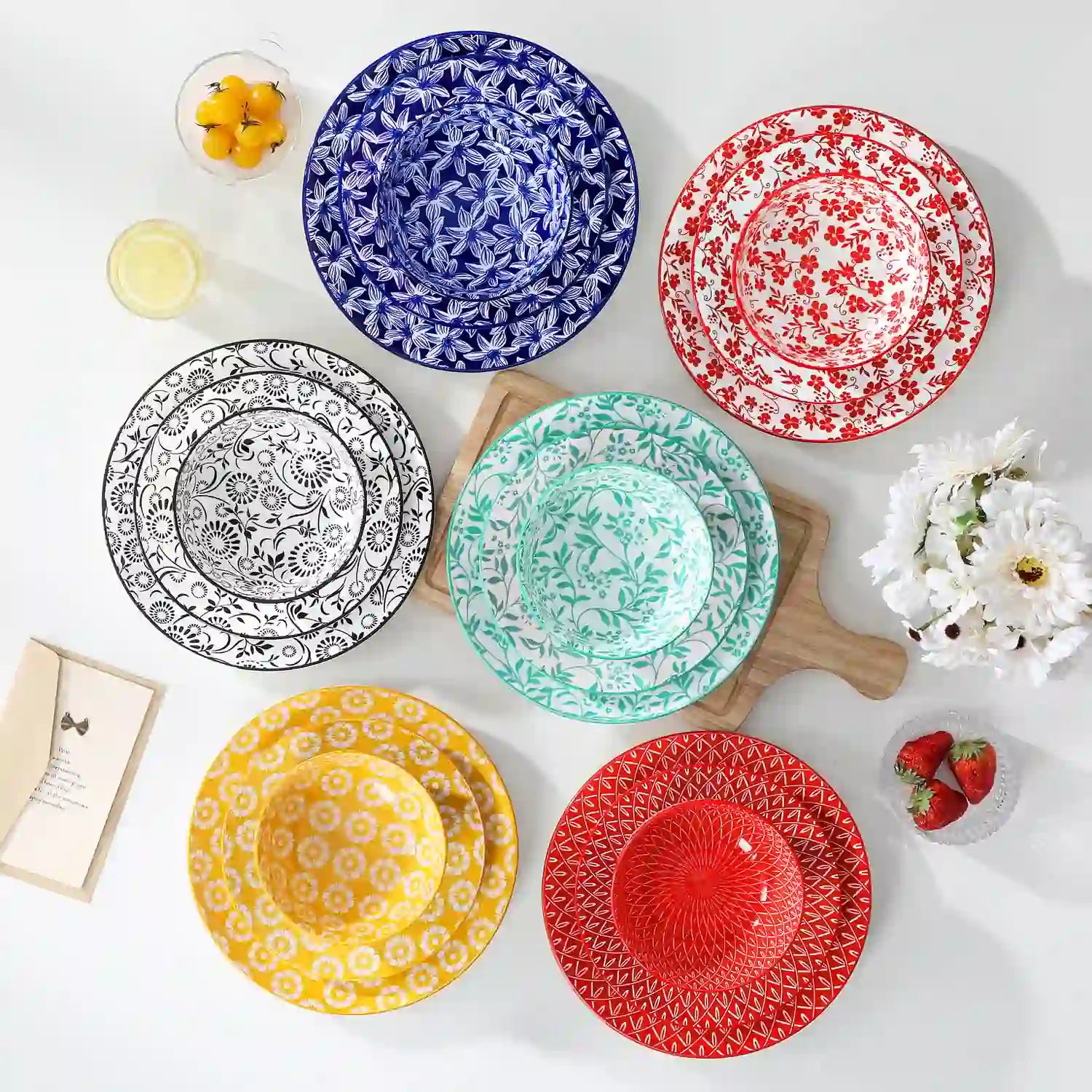Selene porcelain vibrant dinnerware set colorful floral geometric plates bowls table setting with fork knife glass