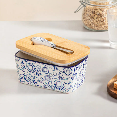 Selene porcelain butter dish Sol pattern with wood lid tabletop scene with bread and fruit