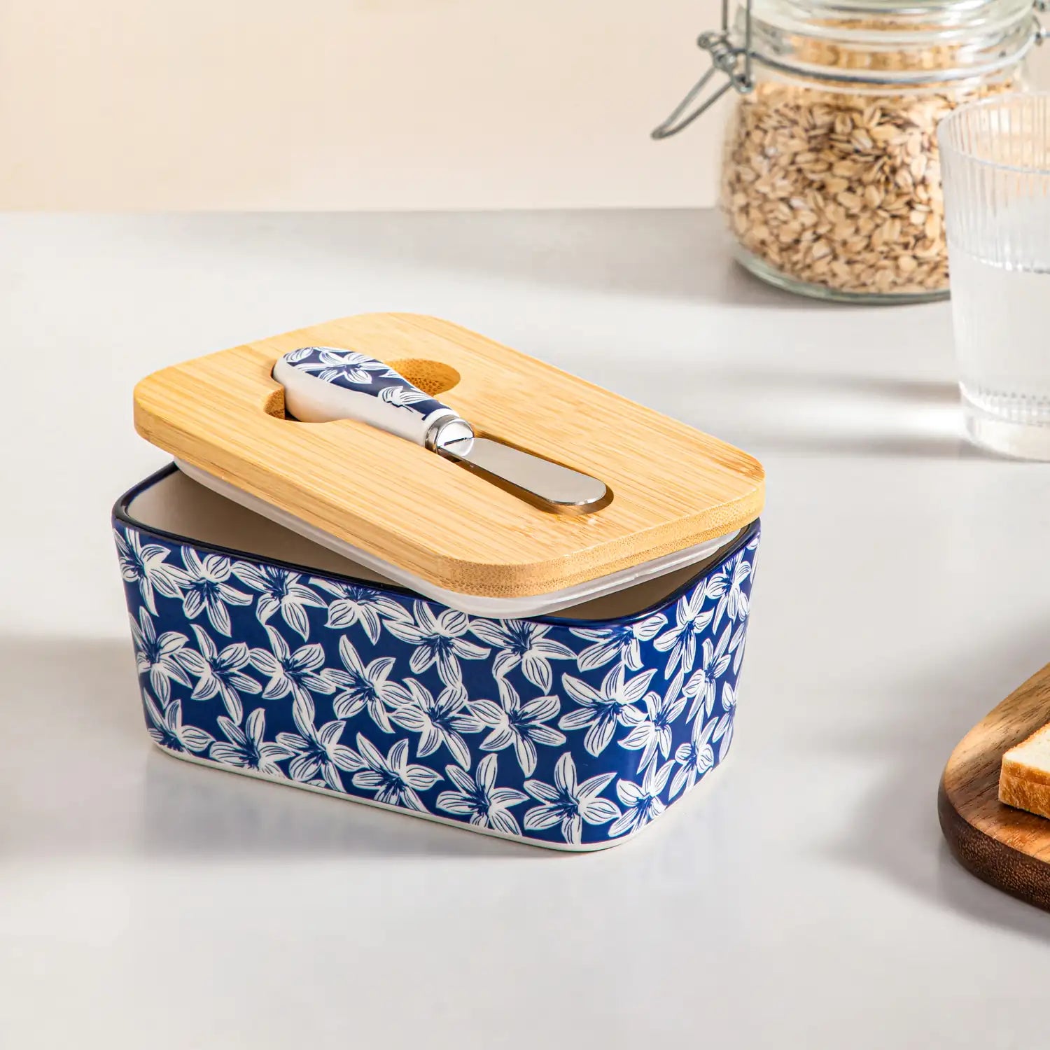 Selene porcelain butter dish Lily pattern with wood lid tabletop scene with bread and fruit