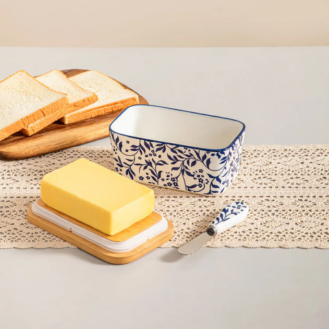 Selene porcelain butter dish Vine pattern with wood lid tabletop scene with bread and fruit