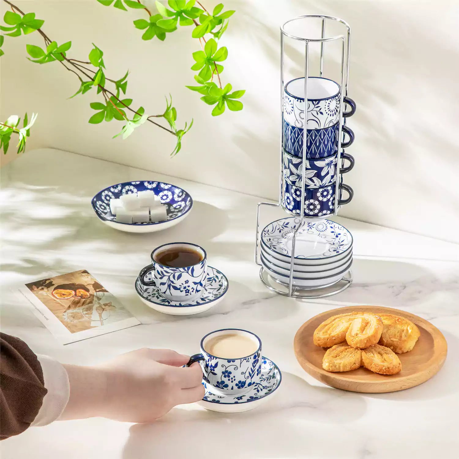 Stackable Selene 3oz blue and white indigo pattern porcelain espresso cups and saucers with a minimalist metal organizer