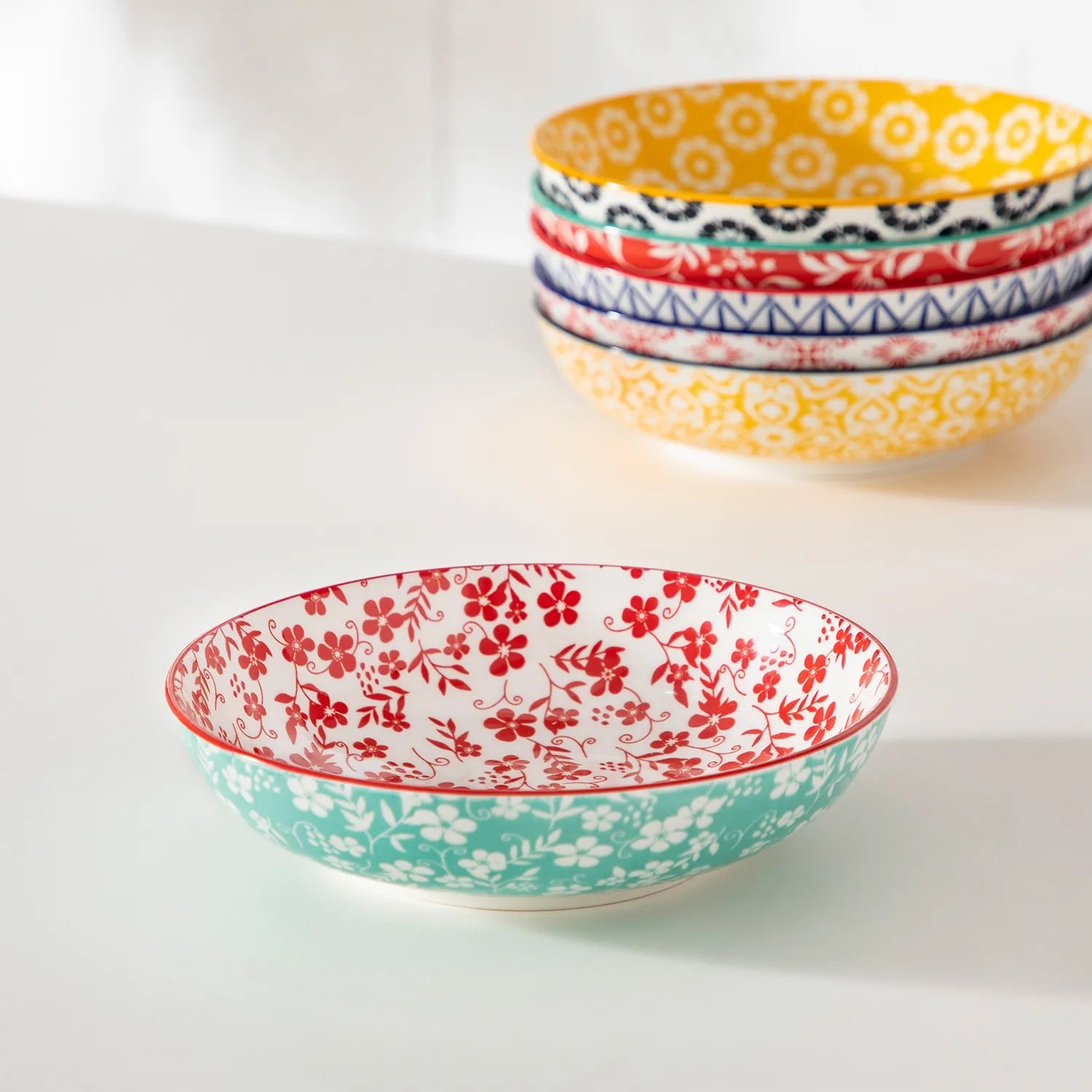 Selene porcelain vibrant pasta bowls set of 6 colorful floral geometric flat lay with breakfast food