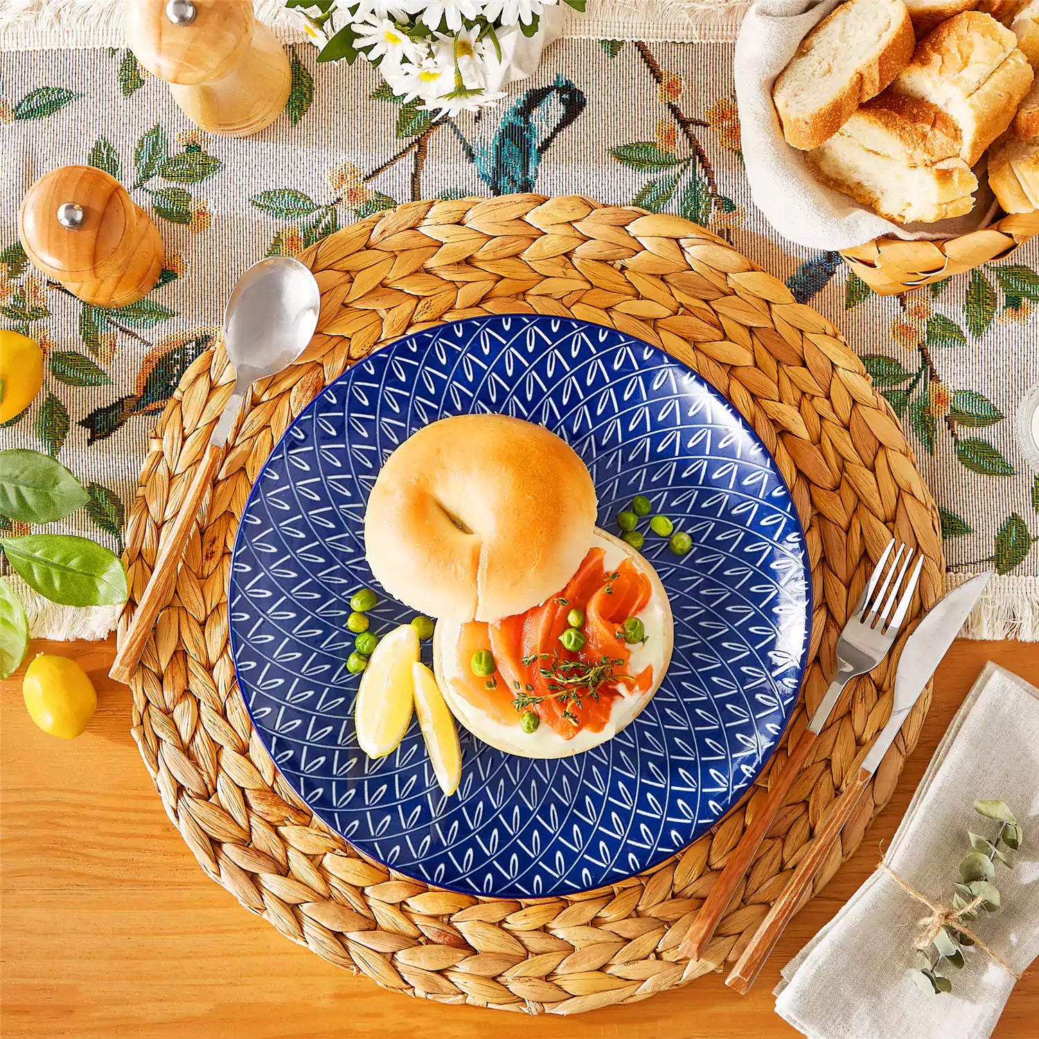 Selene porcelain dinner plates set of 4 styled with pizza and bread on woven placemat mix and match Japanese inspired table setting