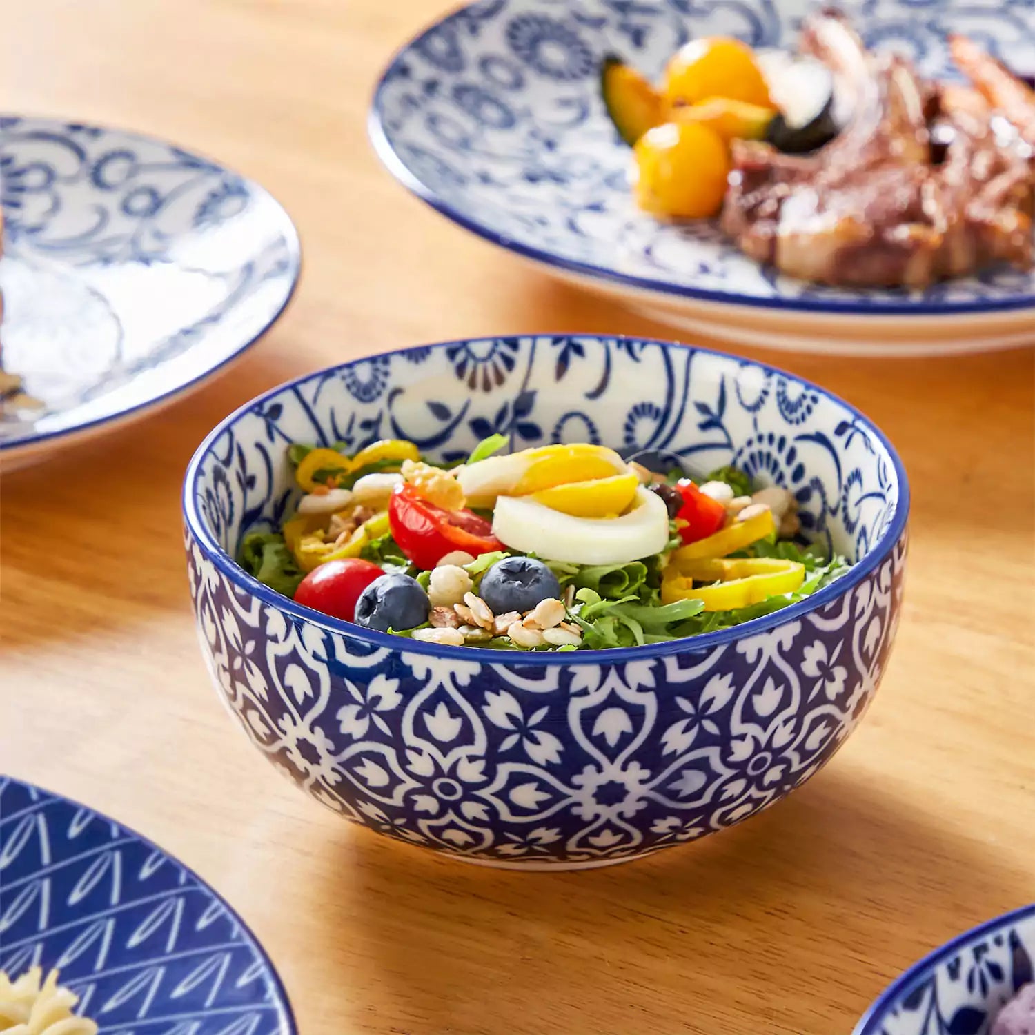 Selene 16-Piece Porcelain Dinnerware Set | Indigo Floral & Geometric ...