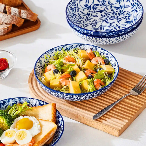 Selene porcelain indigo pasta bowls set of 4 blue white floral Japanese-inspired tabletop scene with food