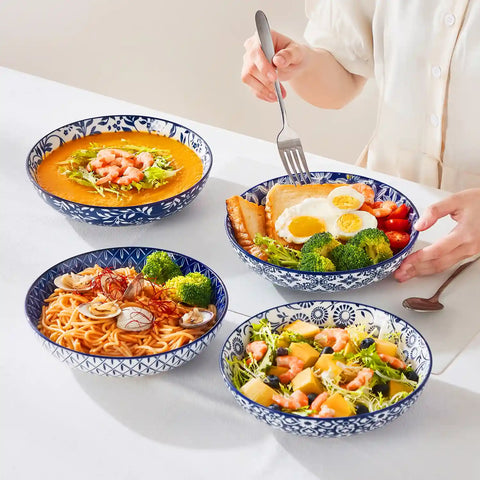 Selene porcelain indigo pasta bowls set of 4 blue white floral Japanese-inspired tabletop scene with food