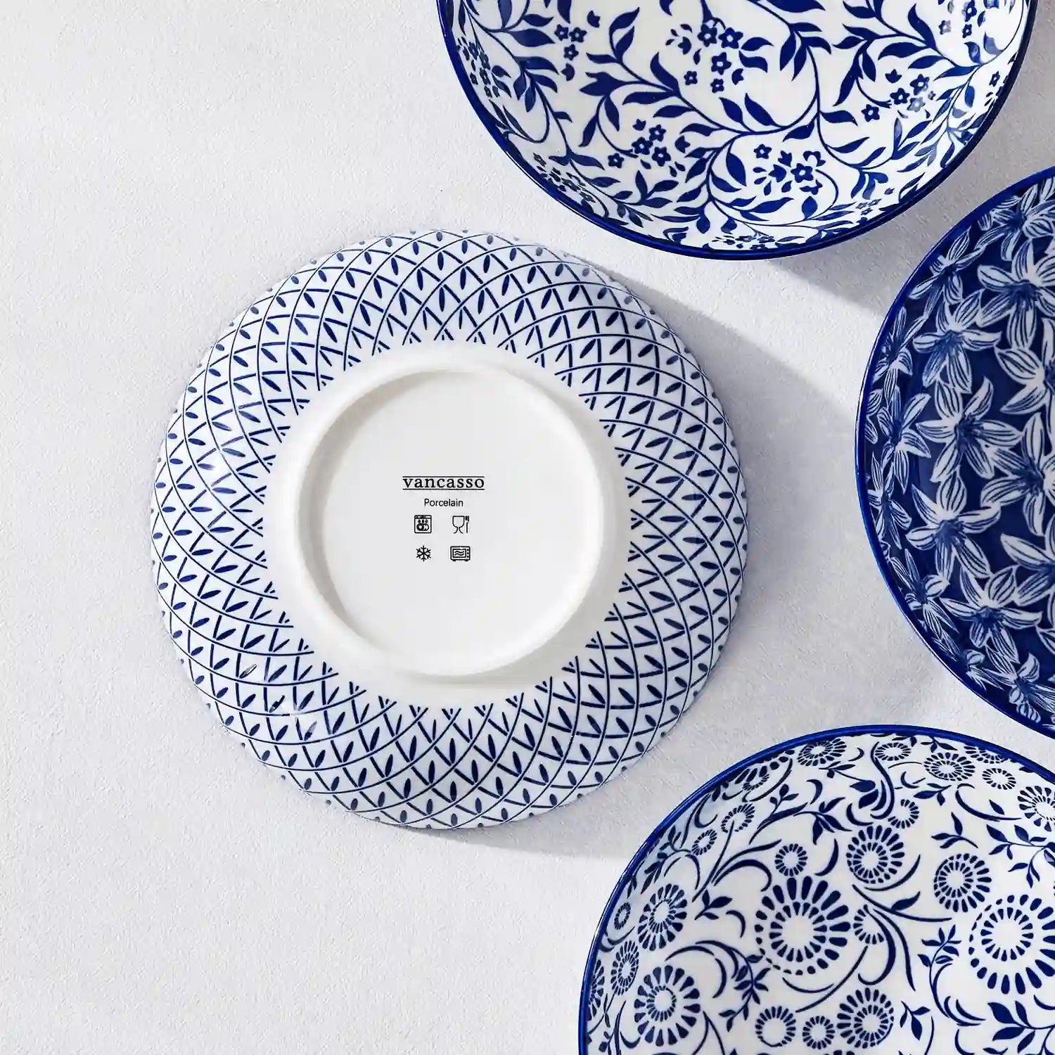 Selene porcelain indigo pasta bowls set of 4 blue white floral Japanese-inspired tabletop scene with food