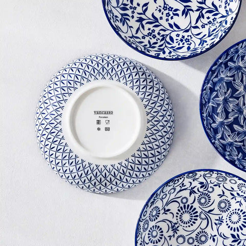 Selene porcelain indigo pasta bowls set of 4 blue white floral Japanese-inspired tabletop scene with food
