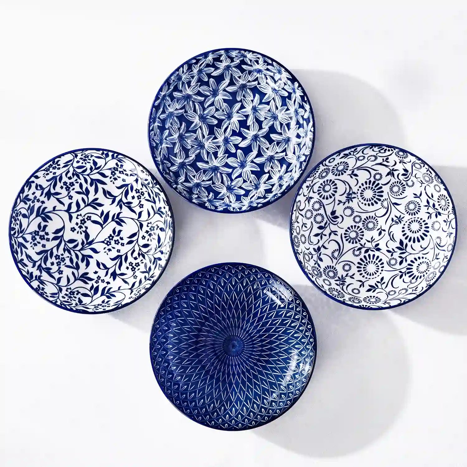 Selene porcelain indigo pasta bowls set of 4 blue white floral Japanese-inspired tabletop scene with food