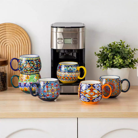 Simi deep round porcelain mugs 15oz set of 6 on cream table with coffee coffee machine beans and greenery Bohemian style-vancasso