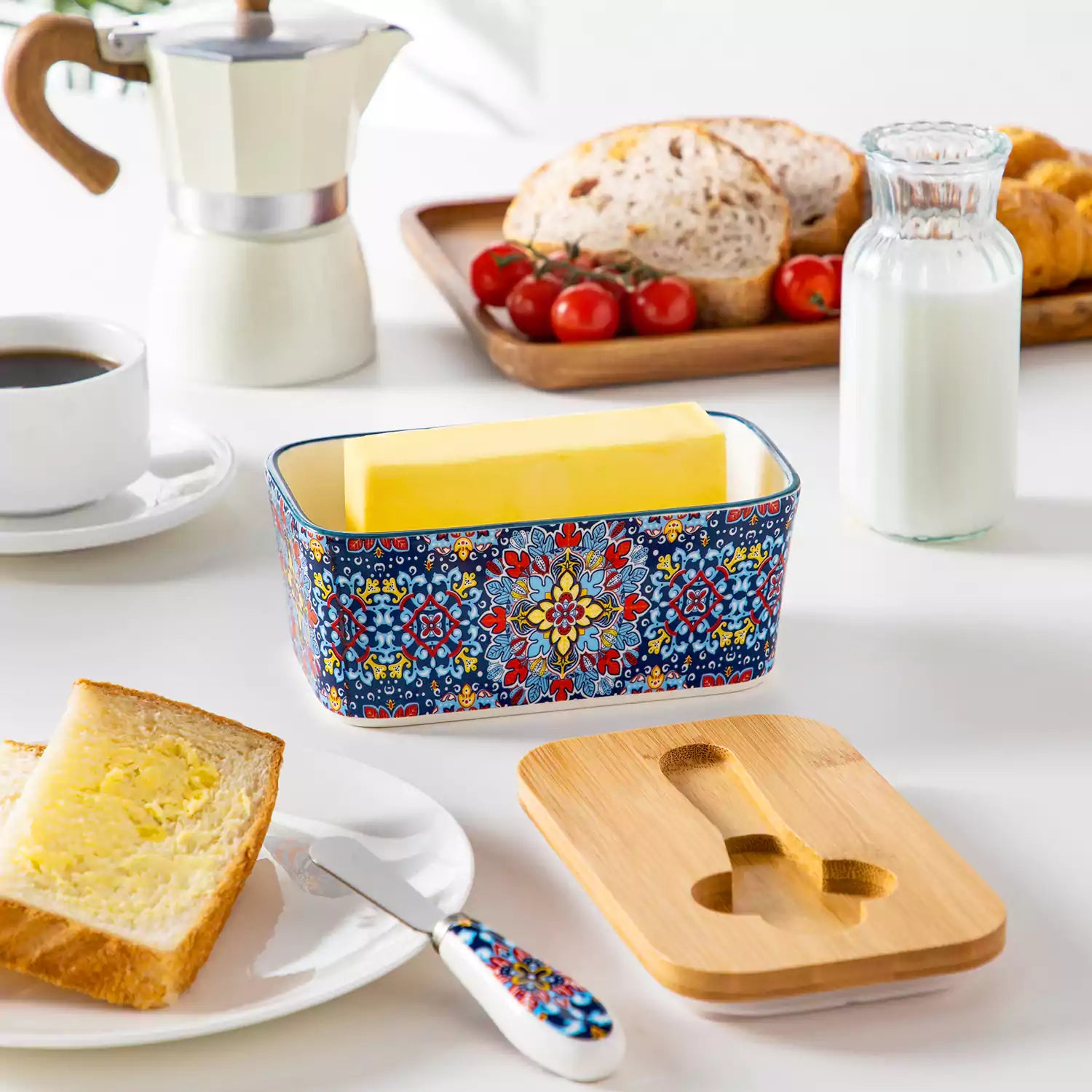 Midnight blue porcelain butter dish with wooden lid in boho chic style - perfect for a colorful breakfast table with bread and coffee-vancasso