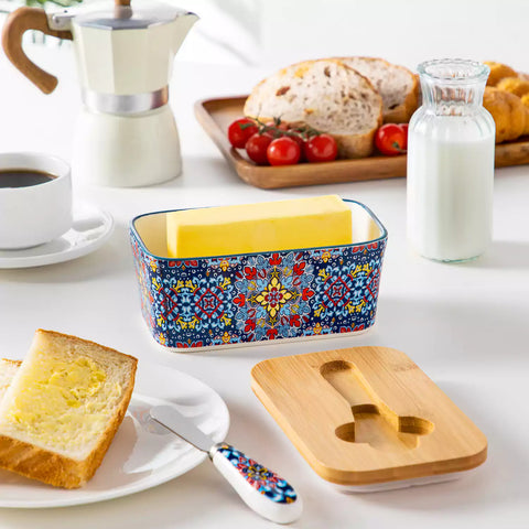 Midnight blue porcelain butter dish with wooden lid in boho chic style - perfect for a colorful breakfast table with bread and coffee-vancasso