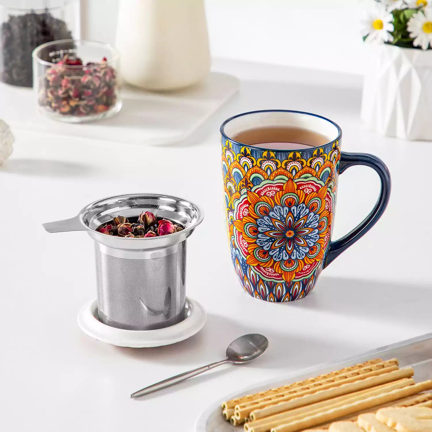 Simi tea mug with infuser and lid colorful forest green boho chic ceramic coffee cup with spoon and loose tea leaves on white background 