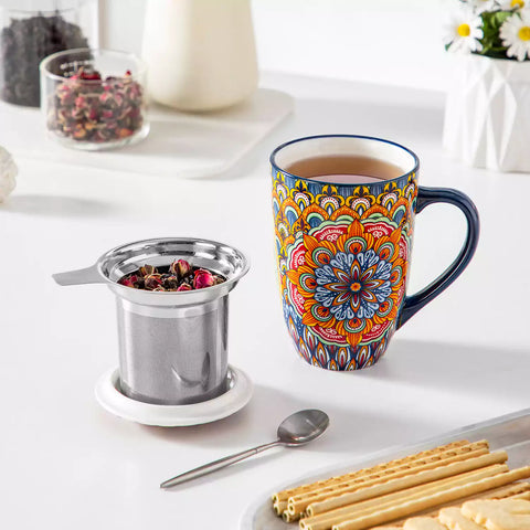 Simi tea mug with infuser and lid colorful forest green boho chic ceramic coffee cup with spoon and loose tea leaves on white background 