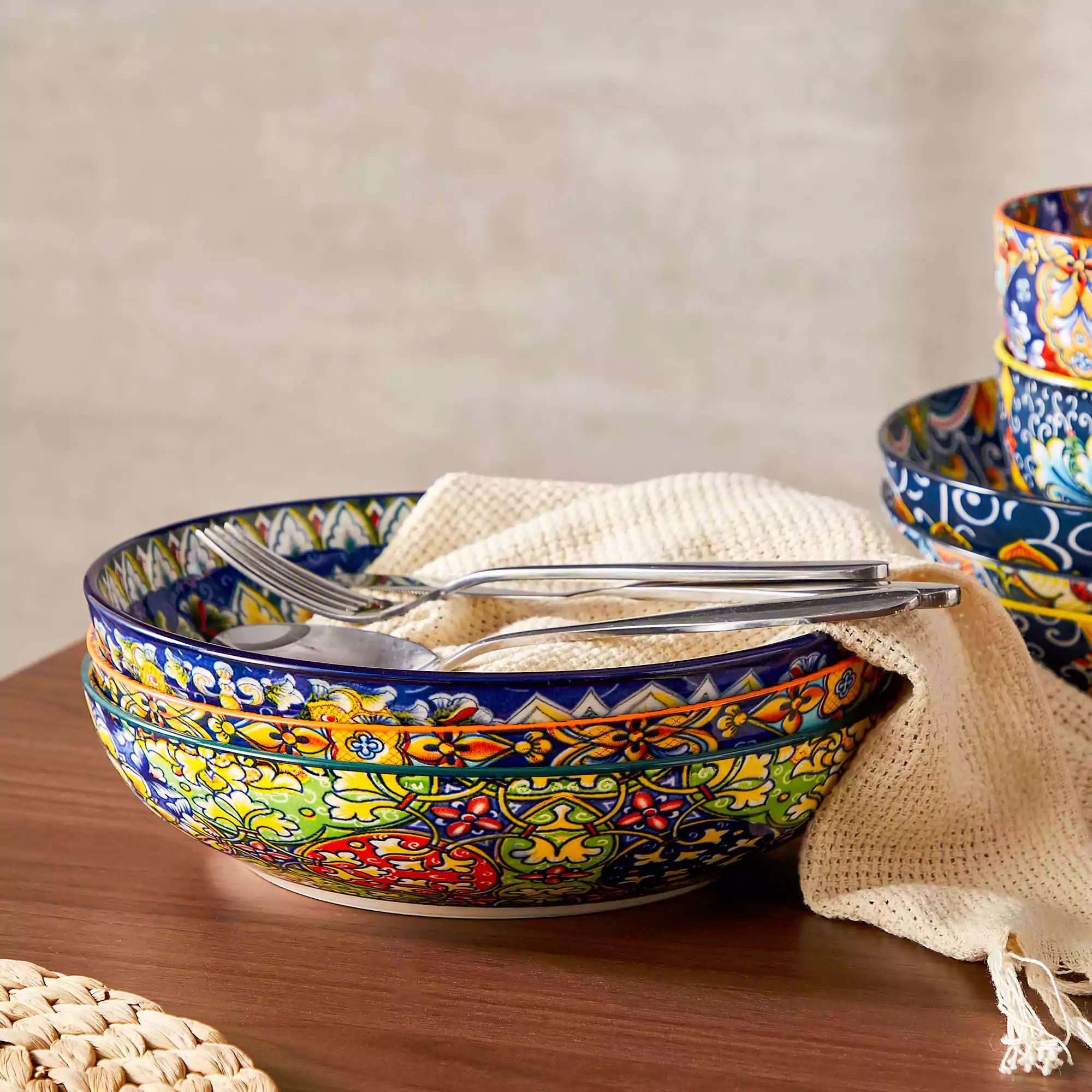 Boho chic porcelain pasta bowls set of 6 with colorful cherry tomatoes and lemons on a wooden surface-vancasso