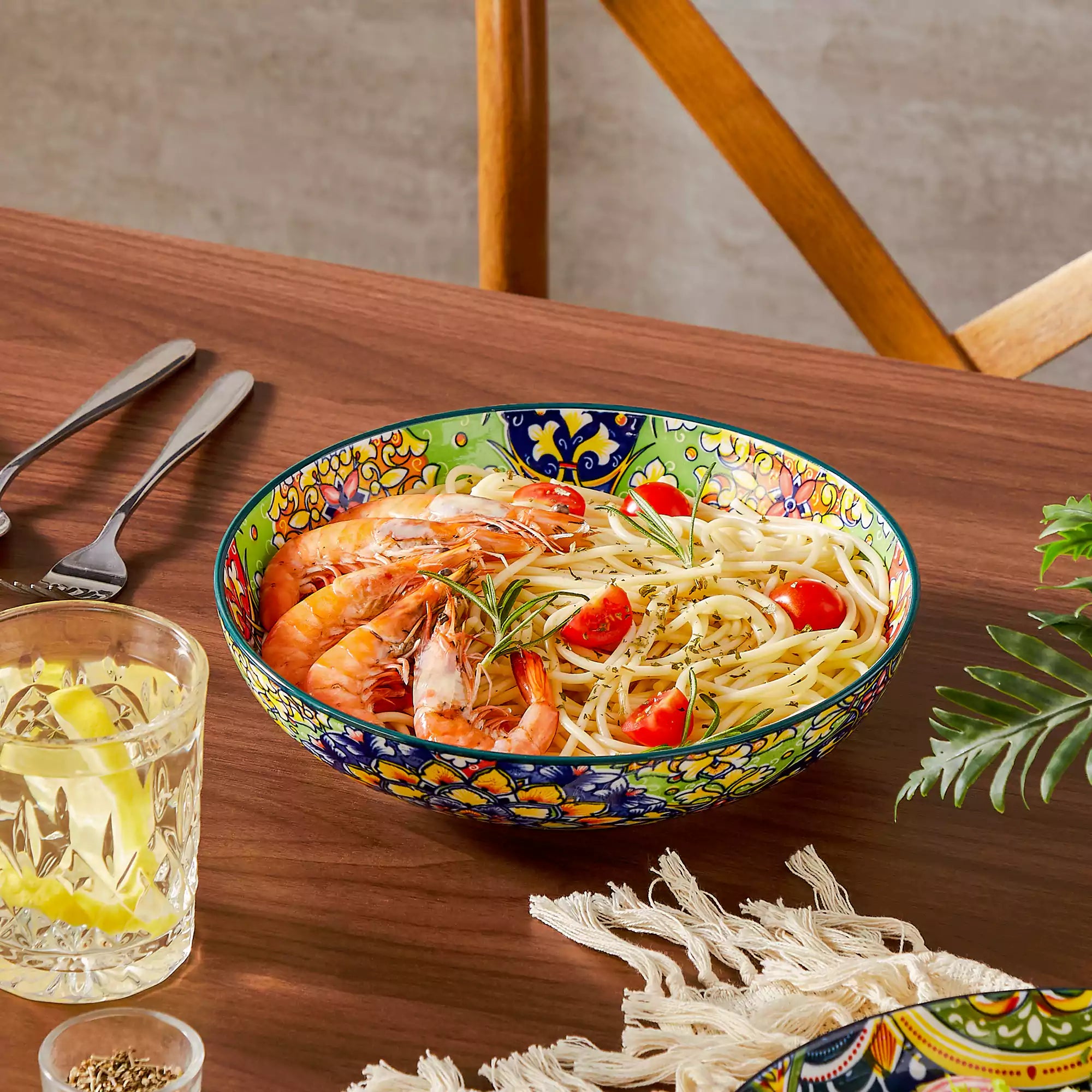 Boho chic porcelain pasta bowls set of 6 with colorful cherry tomatoes and lemons on a wooden surface-vancasso