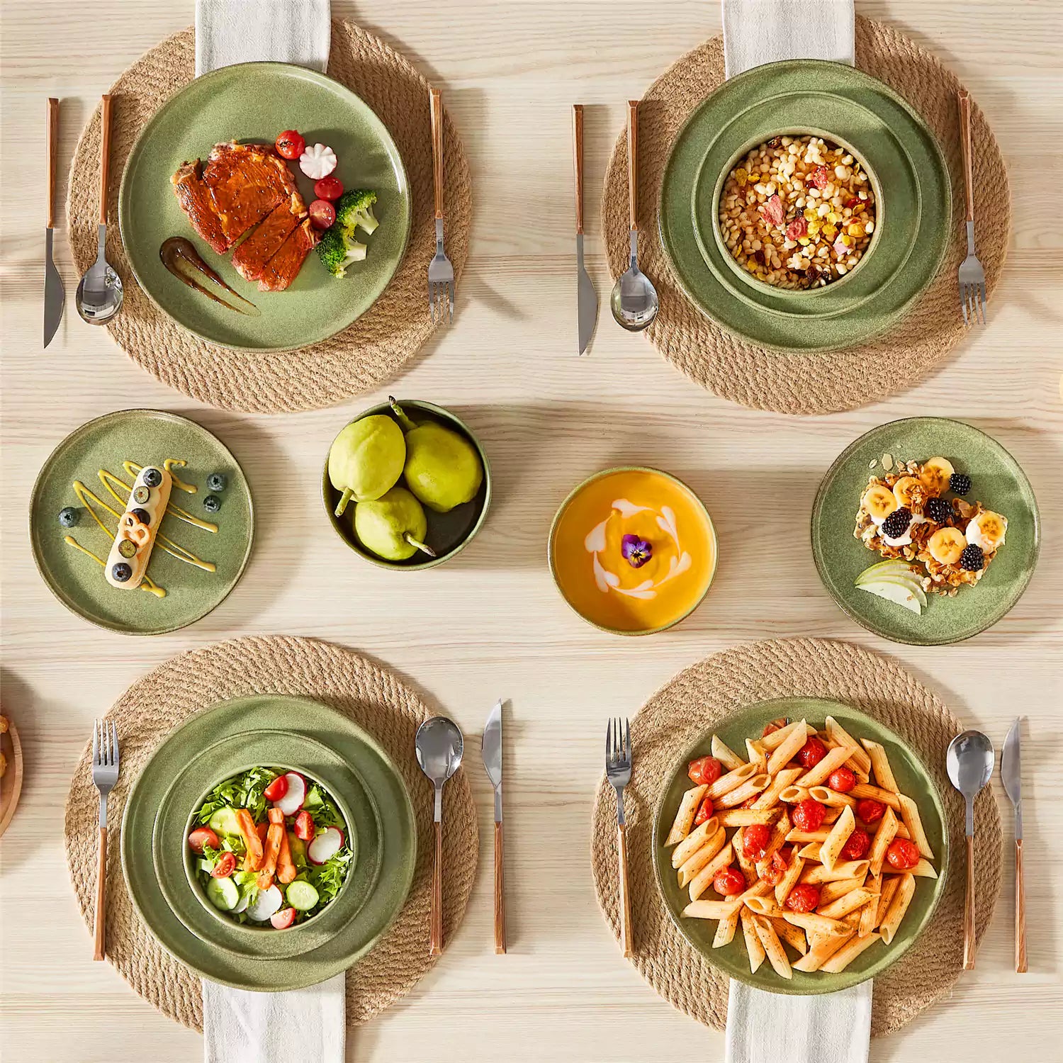 Green reactive glaze stoneware dinner plates styled with food on rustic wood table with woven placemats modern minimalist tableware set