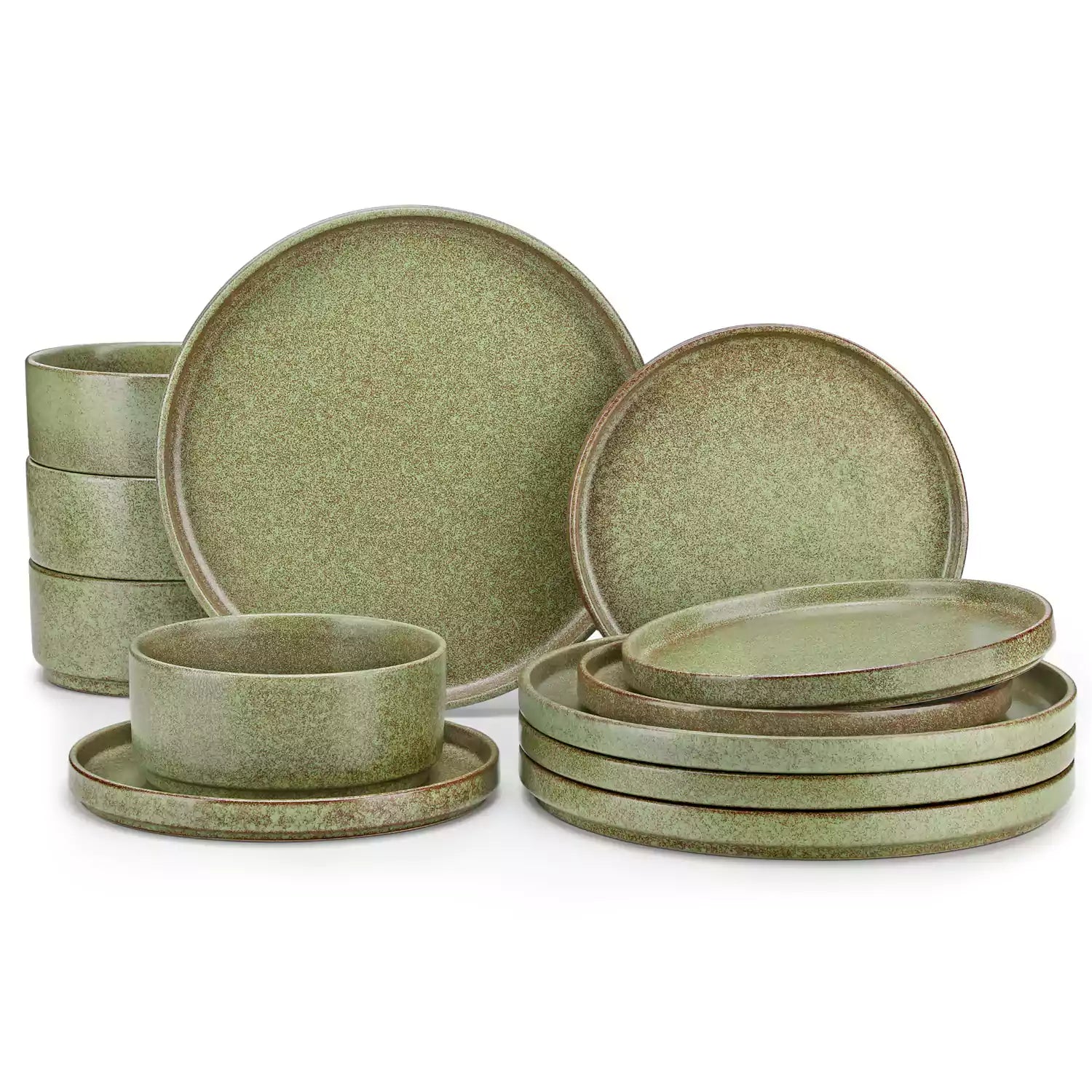 Green reactive glaze stoneware dinner plates styled with food on rustic wood table with woven placemats modern minimalist tableware set
