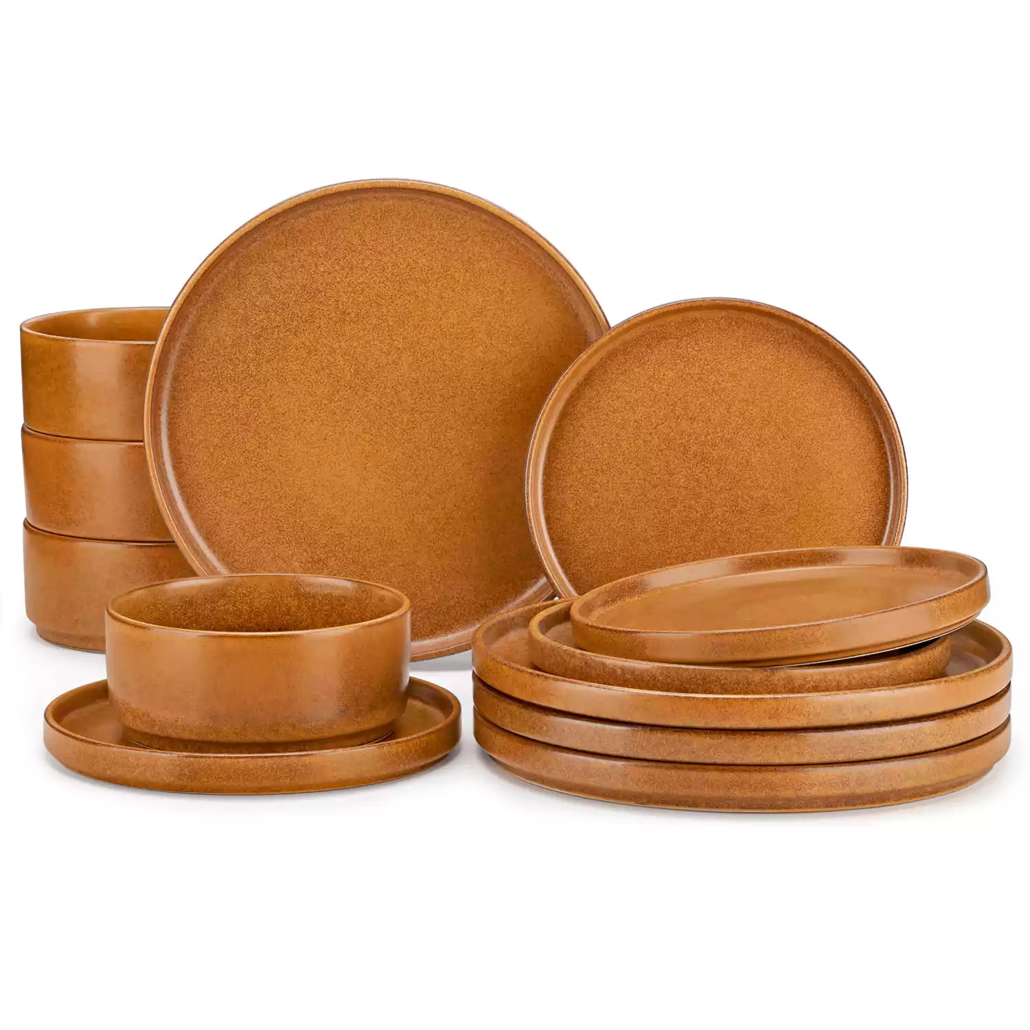 Caramel reactive glaze stoneware dinner plates styled with food on rustic wood table with woven placemats modern minimalist tableware set